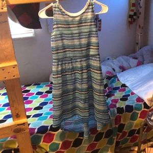 A nee high dress. Color is blue